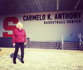 Barbara Giacino grins ear-to-ear when she gets her first glimpse of the Carmelo K. Anthony Basketball Center.